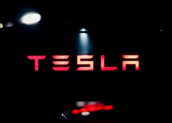 Tesla holds bitcoin steady, reports $112M impairment loss