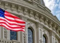 Coinbase Fires Back at Senator Warren Over CLARITY Act Sanctions Warning